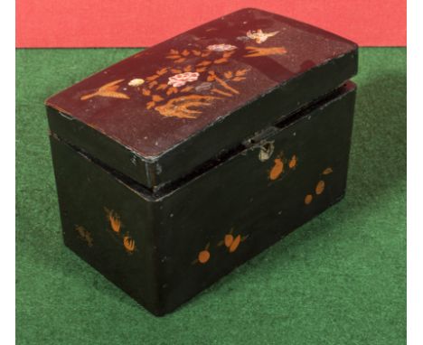 A small papier mache tea caddy