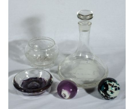 A ships decanter, two bowls and two glass paperweights