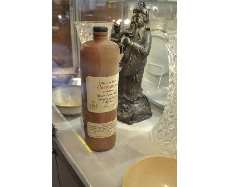 A bottle of Bols Corenwyn gin 1l. 