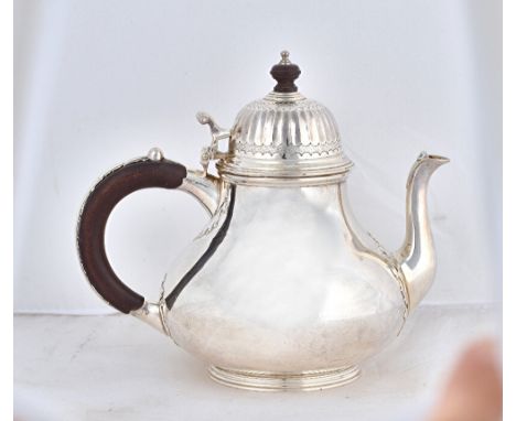 A silver four piece tea and hot chocolate/coffee set, comprising; a teapot, a hot chocolate/coffee pot, a twin handled sugar 