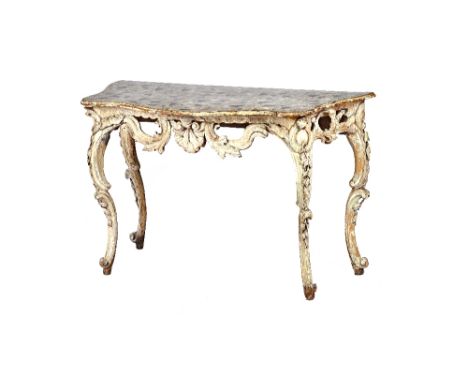 An 18th century Italian console table, the later serpentine painted faux marble top over a whitewashed carved and pierced bas