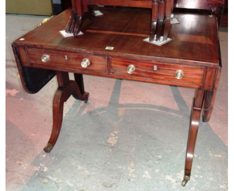 A George III mahogany and rosewood banded sofa table, on dual end supports, 90cm wide x 73cm high.