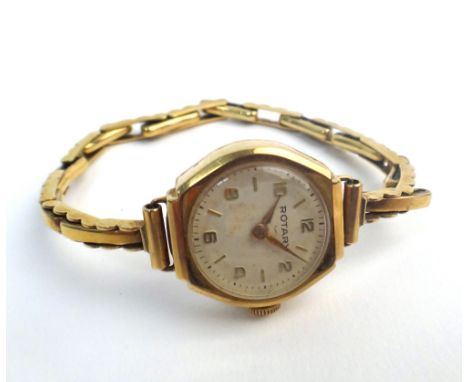 A Rotary 9ct gold cased lady's wristwatch, the signed circular silvered dial with gilt Arabic and hyphen numerals, on an expa