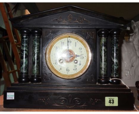 A 19th century black slate and marble eight day mantel clock, 31cm wide x 26cm high.