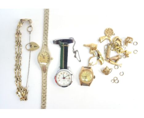 A 9ct gold gatelink bracelet, with a heart shaped padlock clasp, fifteen mostly 9ct gold charms, including; two fish, a Vikin