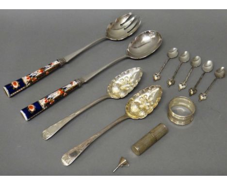 A pair of silver berry spoons, the bowls embossed and engraved with foliage and fruit, London 1811, further silver comprising
