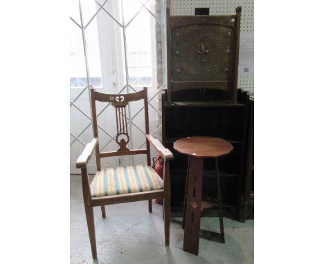 A group of 20th century oak Art Nouveau furniture, comprising; an open armchair, an octagonal side table (38cm wide x 76cm hi