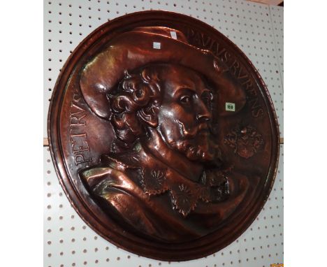 An early 20th century large circular embossed copper charger, depicting a portrait of 'Peter Paul Rubens', 66cm diameter.