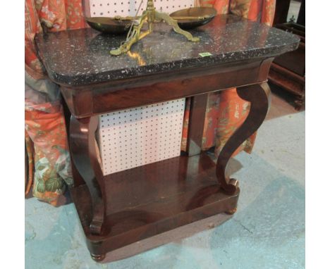 An early 19th century French mahogany console table, with black marble top on scroll supports (a.f), 79cm wide x 82cm high.