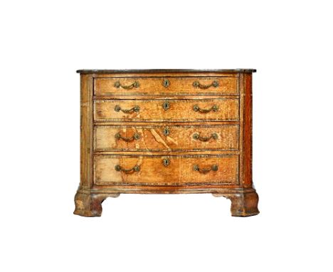 A George III inlaid and crossbanded mahogany serpentine chest of four long graduated drawers, on outstepped ogee bracket feet