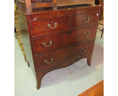 An early 19th century mahogany chest of two short and two long drawers, on bracket feet, 101cm wide.