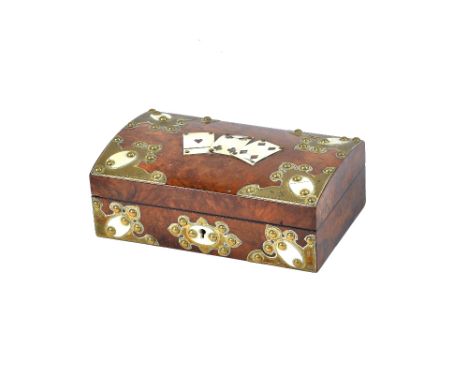 A Victorian gilt metal and ivory mounted dome top playing card box, 22cm wide x 8cm high x 14cm deep. Illustrated 
