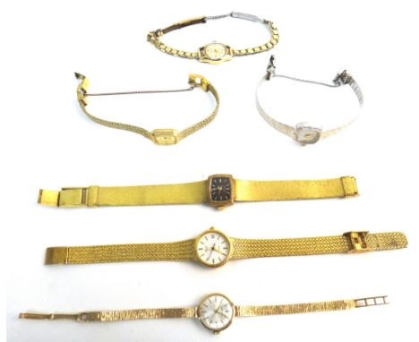 A Garrard 9ct gold lady's bracelet wristwatch, the signed silvered dial with gilt baton shaped numerals, the caseback present
