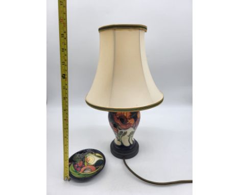 Moorcroft 17T 65/6 Baluster Shape Table Lamp and Shade, along with Moorcroft Pin Dish. 
Good condition, no damage. 