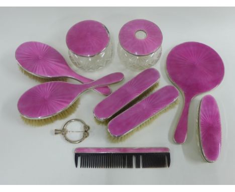 George V silver and pink guilloche enamel dressing table brush set,  Birmingham 1922, comprising  a powder jar, hair tidy jar