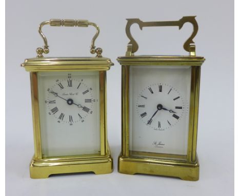 Two brass and glass panelled carriage clocks to include the London Clock company, etc (2) 
