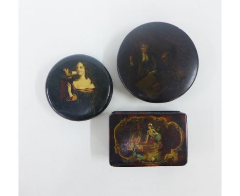 Two late 18th / early 19th century  papier mache snuff boxes, largest 10cm, and a papier mache box with hinged lid and  red p