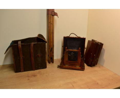 A cased Mahogany plate camera (glass plate cracked) with Mayer-Werlitz Nettar Anastigmat 1:6,8 13.5cm lens,  mahogany back pl