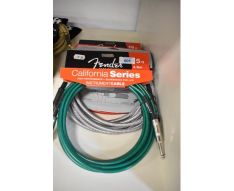 Four Fender 4.5metre instrument cables , Red, Green and two silver tweed (as new shop stock)