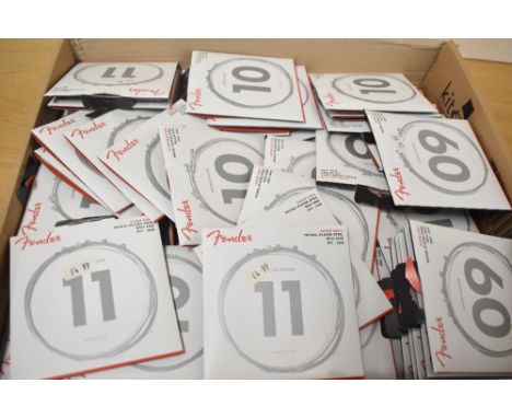 A large selection of Fender electric guitar strings, various gauges and types