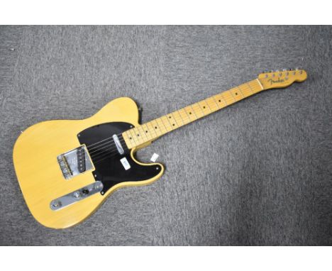 A Fender 52 reissue Telecaster electric guitar in butterscotch blonde finish, with yellow tweed hard case