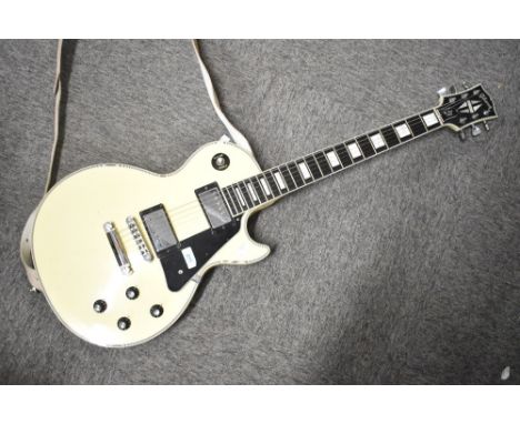 A 2012 Les Paul Custom electric guitar , serial number 120620479 (volume and tone knobs replaced) , with Gibson fitted case