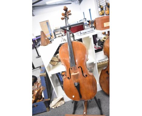 A traditional cello , probably 19th Century , having two piece back, cant see label to interior , bridge stamped Aubert. Sold