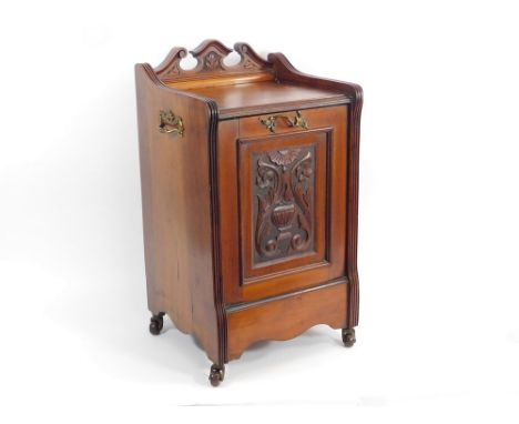 COAL BOX. A Victorian mahogany fall-front coal box with shovel. Fitted with ceramic castors. H67xW37xD35cm.  Please note that