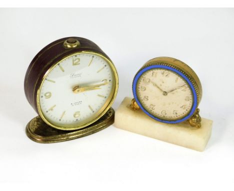 BEDSIDE CLOCKS. A Davis gilt metal bedside alarm clock. Height 6.5cm. Also, one other small bedside clock with blue enamelled