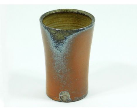 JACK DOHERTY. A Jack Doherty, Leach Pottery soda glaze beaker. Pottery mark. Height 11cm.  Please note that all items in this