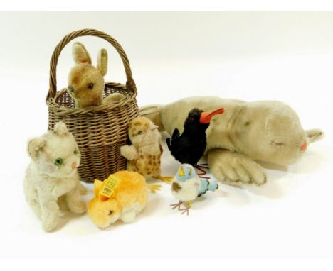 STEIFF. A collection of seven Steiff animals including a blackbird, a seal & a blue chick. All with labels except the deer. A