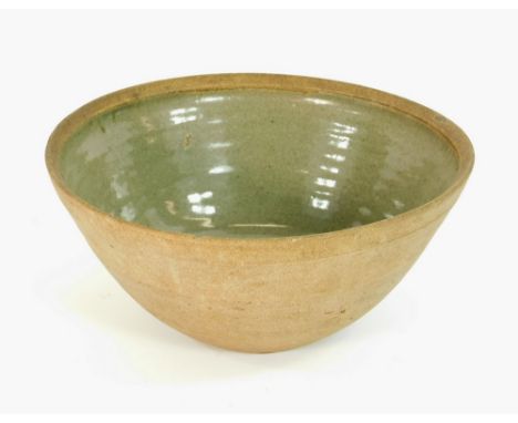 LEACH STANDARD WARE. A Leach Pottery Standard Ware large general purpose bowl. Pottery mark. Diameter 25cm. Two small glaze f