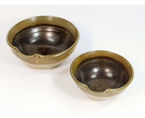 ROWENA KINSMAN. Two matching soda glaze pouring bowls. 20cm & 15cm diameter. Impressed 'R' mark.  Please note that all items 