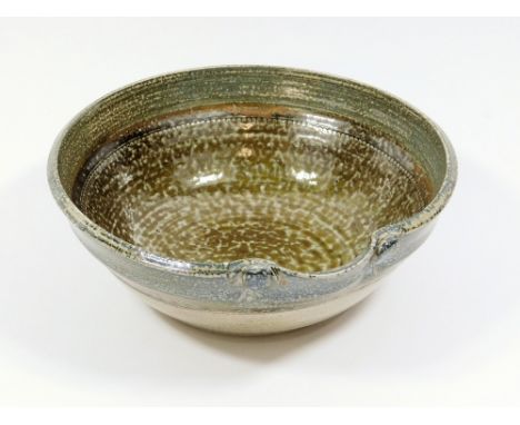 ROWENA KINSMAN. A large soda glaze pouring bowl. 25cm diameter. Impressed 'R' mark.  Please note that all items in this aucti