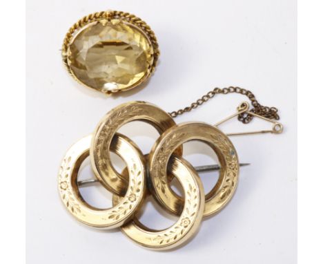  Four circle gold brooch and a gold mounted citrine  brooch both tested to 9ct   Condition Report   Click here for further im