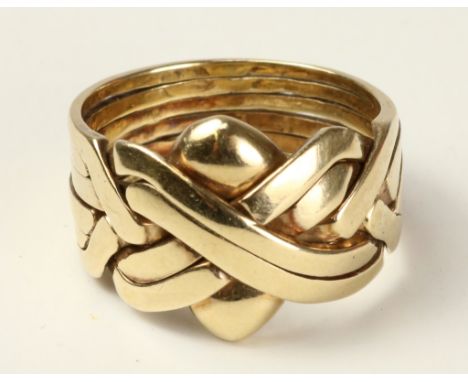 Gold puzzle ring hallmarked 9ct approx 12.4gm   Condition Report   Click here for further images, condition, auction times & 