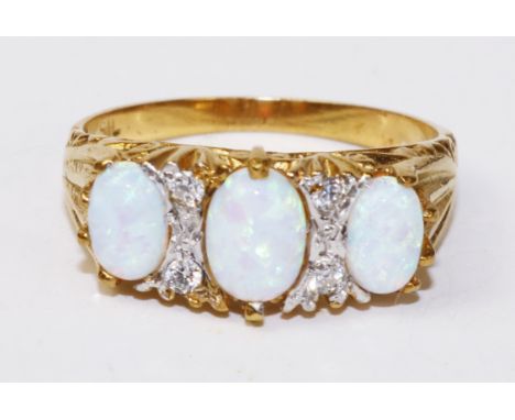 Three stone opal gold-plated ring   Condition Report   Click here for further images, condition, auction times & delivery cos