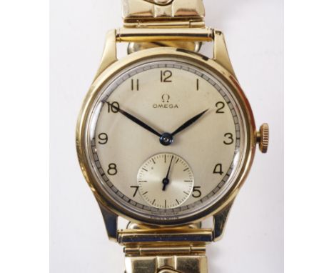 Gentleman's Omega 1950's hallmarked 9ct gold wristwatch on Montal rolled gold expanding bracelet   Condition Report   Click h