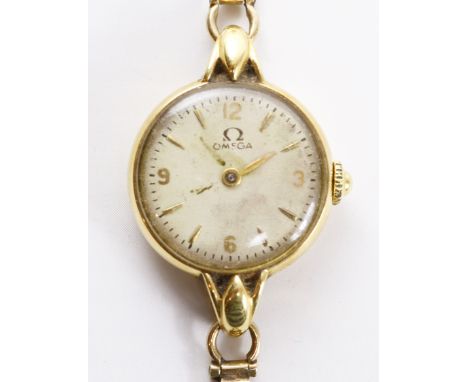 Ladies Omega Swiss hallmarked 18ct gold watch on hallmarked 9ct gold bracelet 17.5gm gross    Condition Report   Click here f