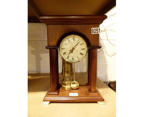 Wooden cased clock and a small miners lamp 