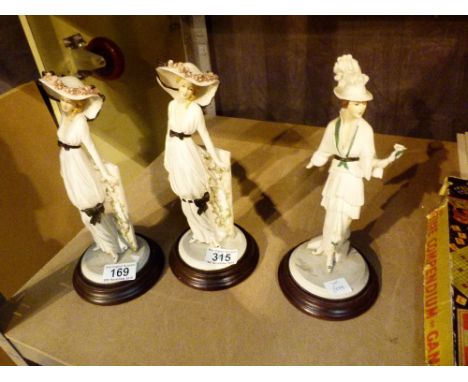 Three ceramic female figurines 