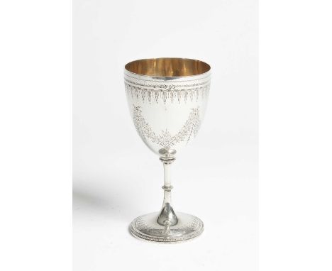 A Victorian silver and silver gilt goblet, Daniel &amp; Charles Houle, London 1869, with engraved swags, beaded knopped stem 