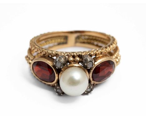 A yellow metal pearl, garnet and diamond ring, the 6.7mm pearl flanked by two oval cut garnets and four rose cut diamonds, ri