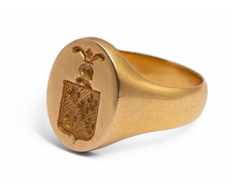 A Continental yellow gold signet ring, engraved with a coat of arms, ring size S½, continental gold standard marks assessed a