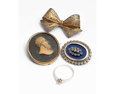 A collection of costume jewellery, including a silver marcasite and blue enamel oval brooch, a silver filigree bow brooch, a 