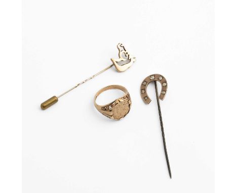 A 9ct gold ring set with a small coin, pierced scrolling shoulders, size Q, approximately 4.4g, a stick pin with diamond set 