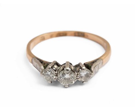 An 18ct yellow gold and diamond three stone ring, set with three round brilliant cut diamond, total estimated diamond weight 