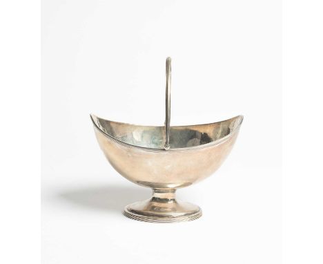 A George III swing-handled silver sugar basin, CC, London 1792, of navette shape with reeded swing handle, 16.5cm long, appro