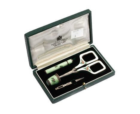 An enamelled four-piece sewing kit retailed by Asprey, casedThe thimble and needle case have Asprey import marks and are in g