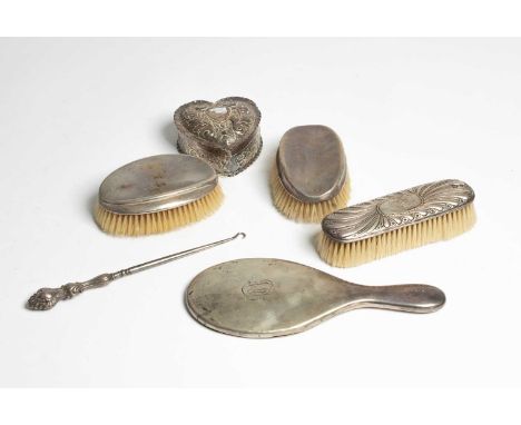 A Victorian silver heart-shaped box Frederick Bradford Macrea, London 1893, with embossed foliate scrolls, 10cm wide, a pair 